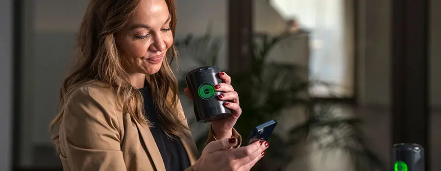Customer using the new Myromi device and app