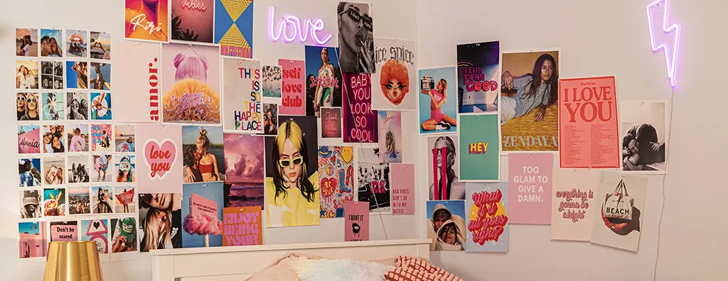 Bedroom view of a GenZ person with posters on the wall, all about love