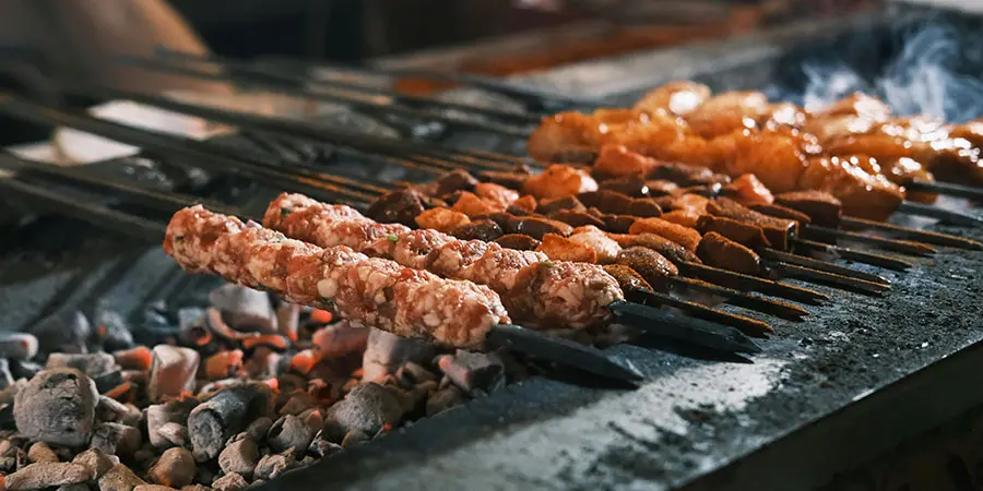 Meat on skewers being grilled