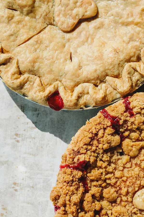 Two pies with red fillings