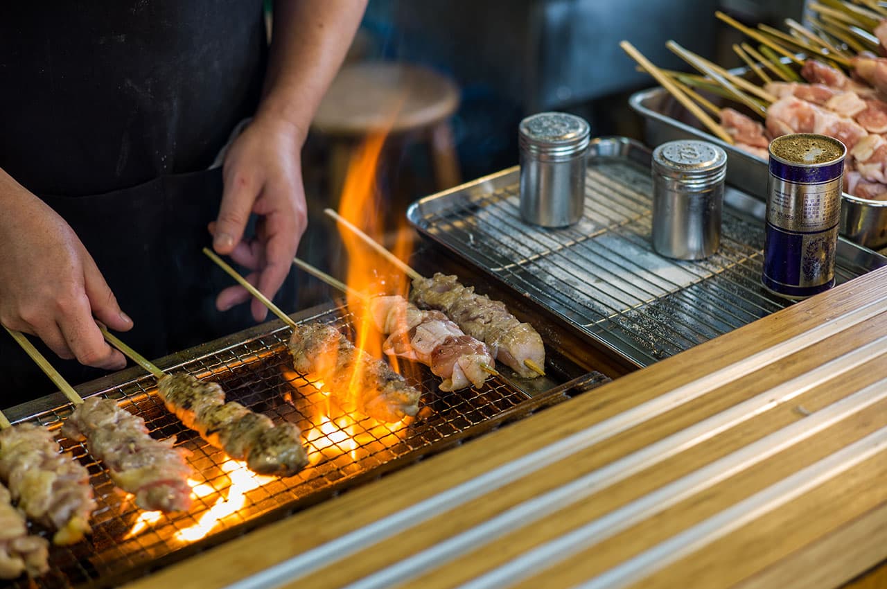 Barbecued chicken satay in Indonesia