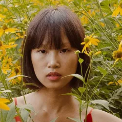 Girl in yellow flower field