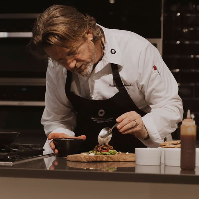 Chef preparing dish