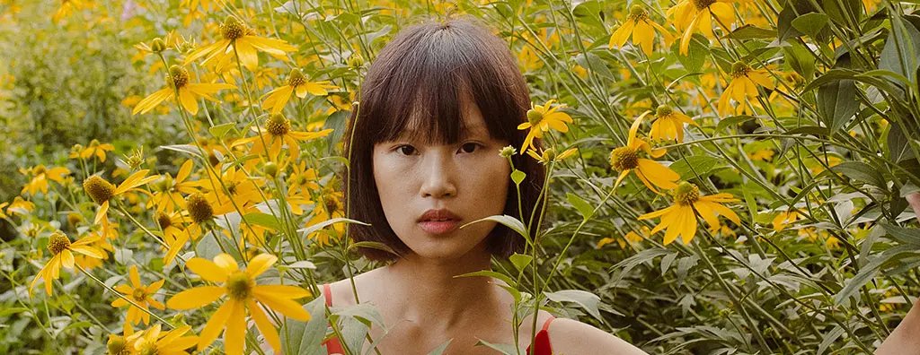 Girl in yellow flower field