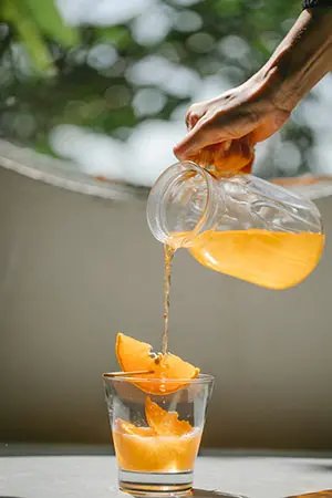 Pouring orange juice