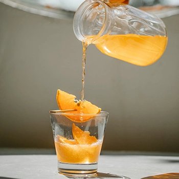 Pouring orange juice