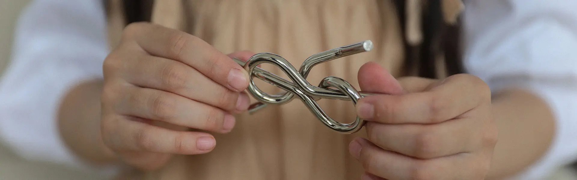 Girl unlocking a puzzle