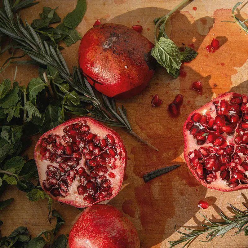Pomegranates with mint and rosemary