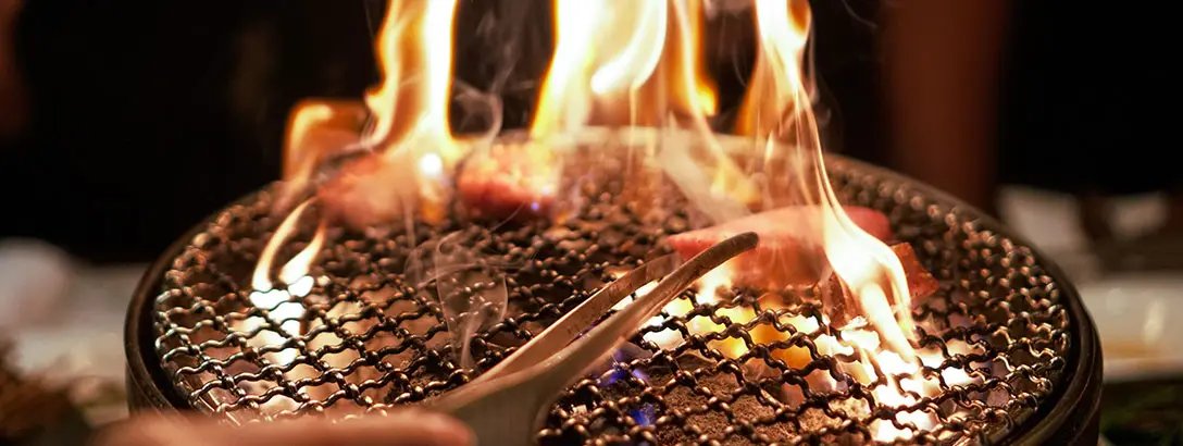 Barbecuing beef on a korean fire grill