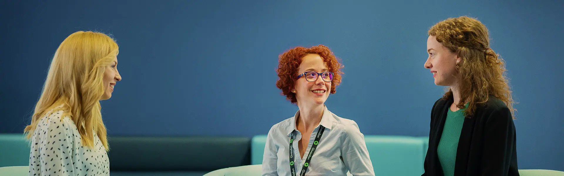 Three woman in a meeting
