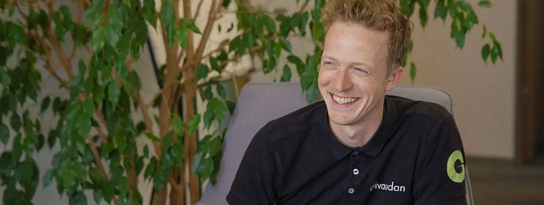 Givaudan employee sitting on a chair