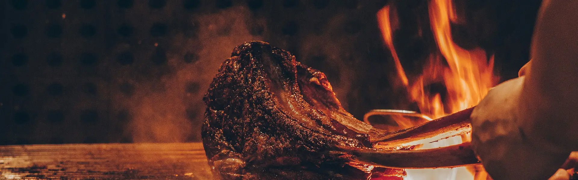 A piece of meat being grilled