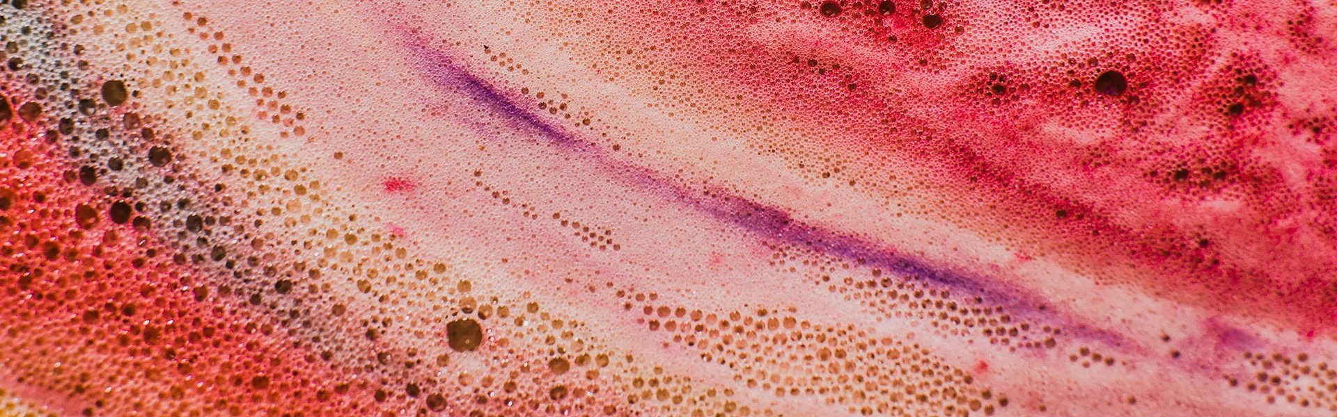 Red swirl of aired liquid