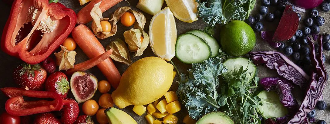 A variety of fruit and vegetables rainbow arranged