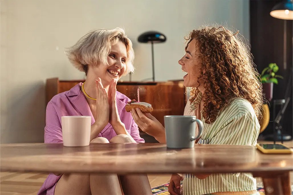 Two woman chatting while drinking tea