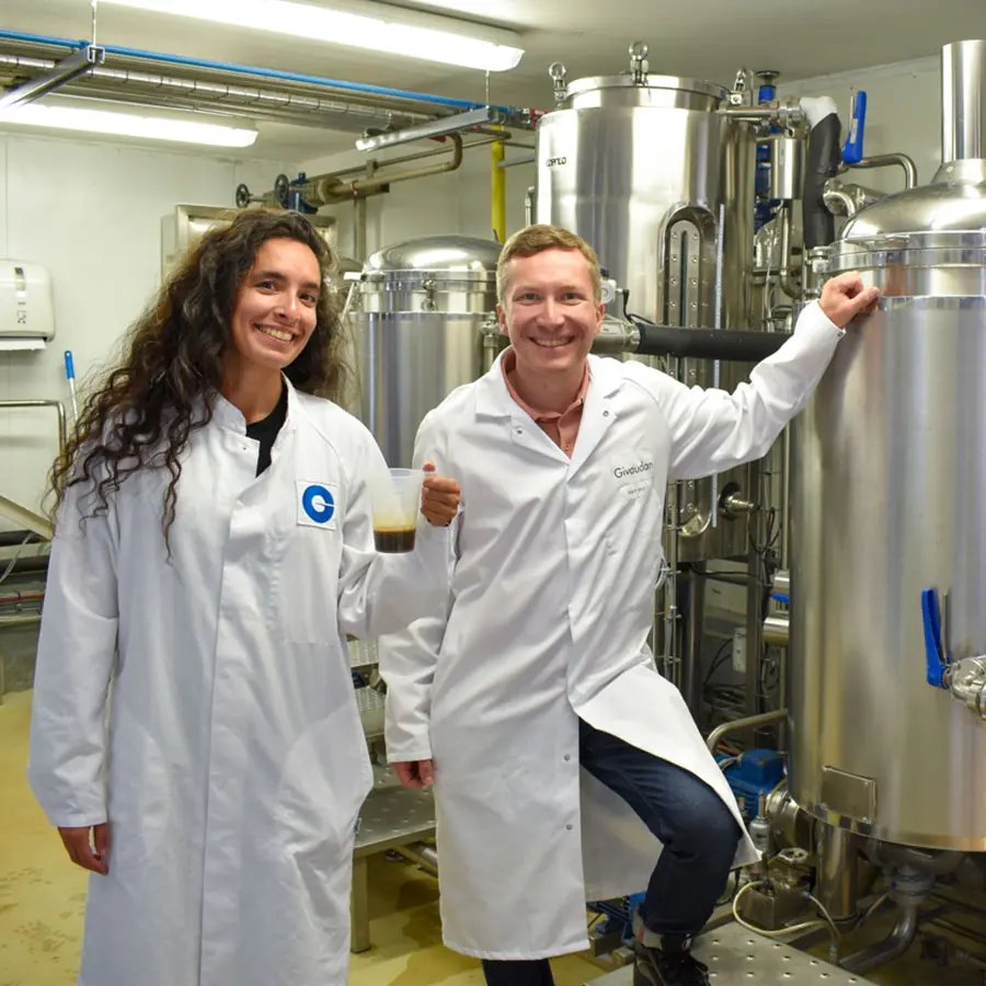 Vanessa Robert and Krystof Michalsky in a brewing lab