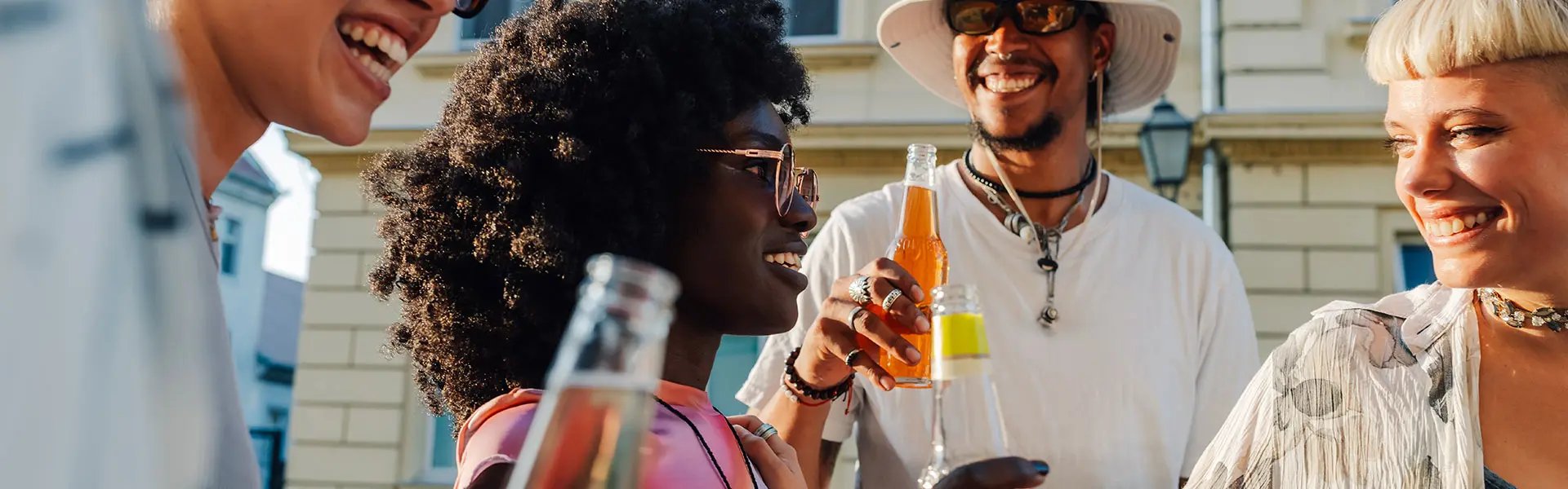 A group of people holding drinks