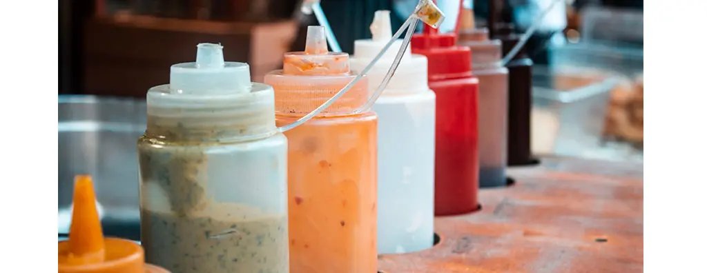 A variety of table sauce bottles