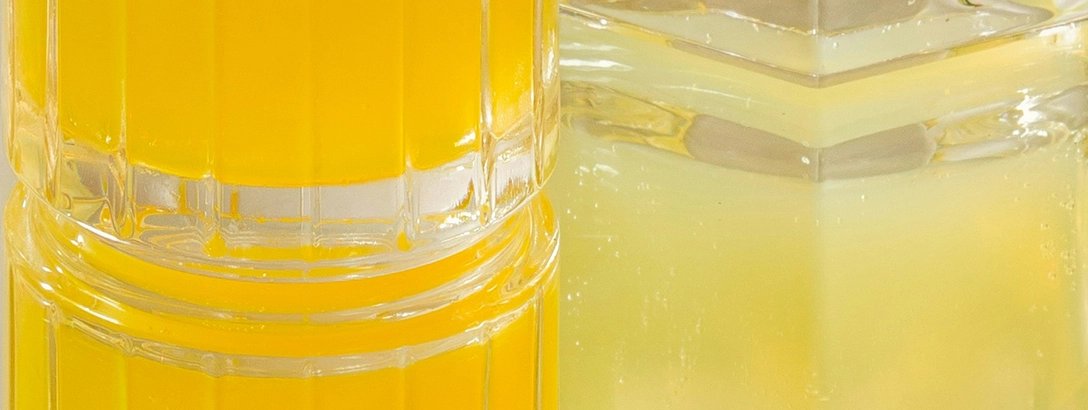 Glasses filled with citrus juice