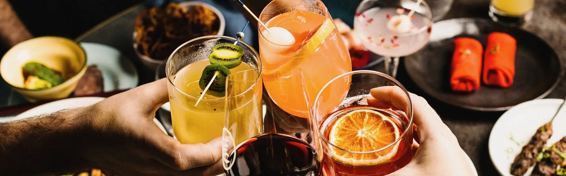 A toast with a variety of beverages