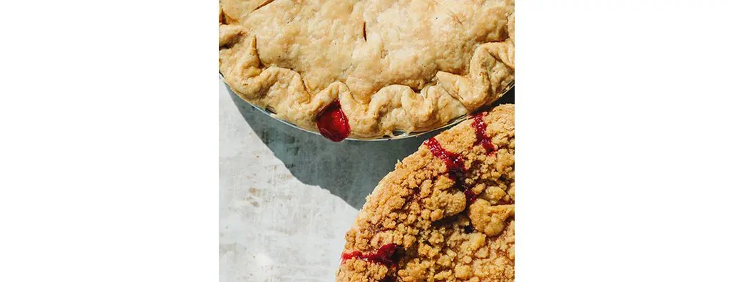 Two pies with red fillings