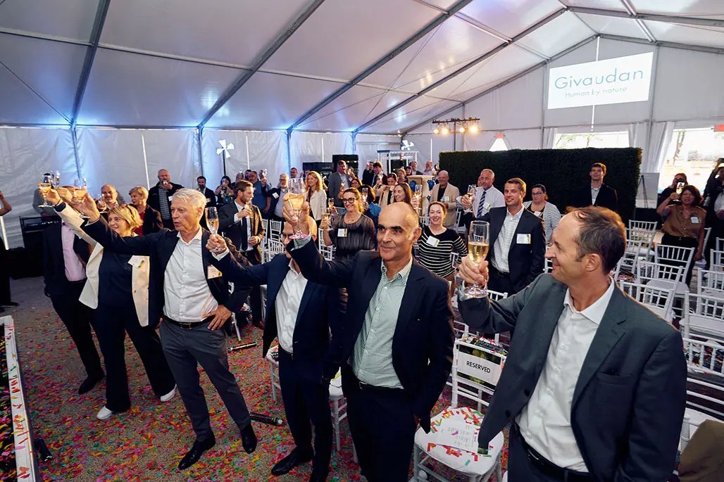 A champagne toast with the EC, officials and Givaudan employees