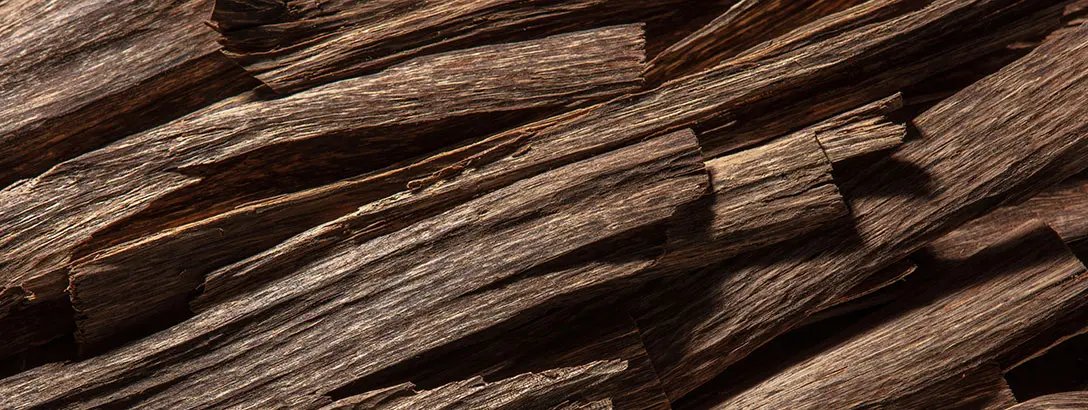 Close up of numerous pieces of dark wood
