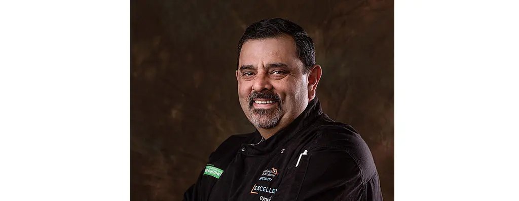 Headshot of chef Cyrus Todiwala