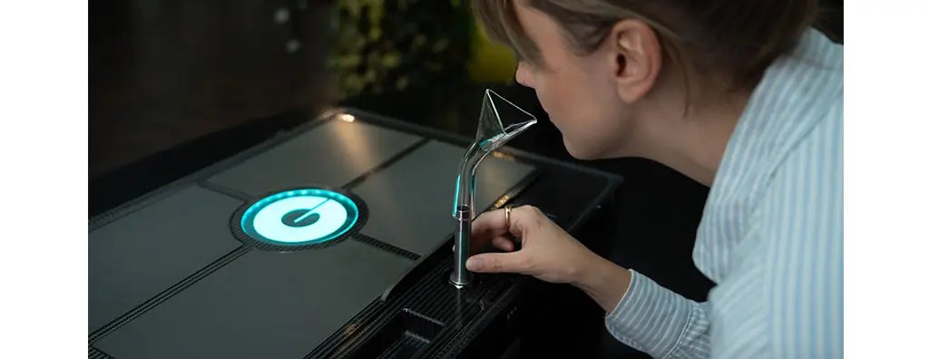 A person leans in the VAS-Air. The setting appears modern and focused on innovation, with soft lighting enhancing the atmosphere.