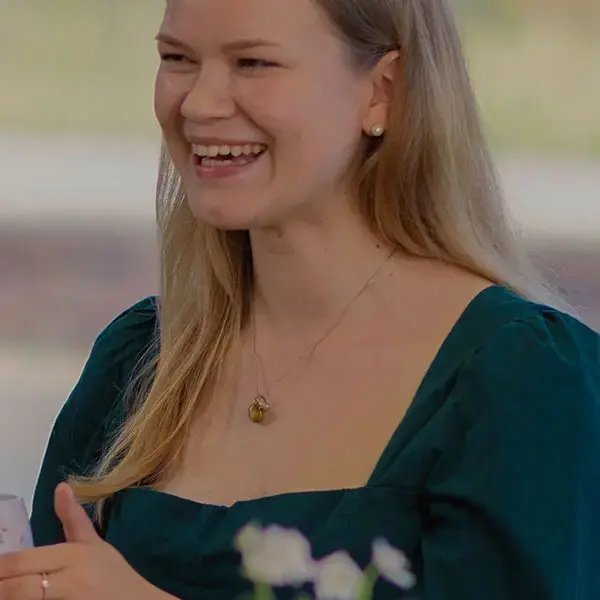 Woman smiling in a workplace setting